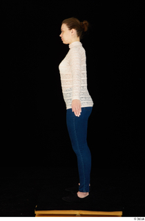  Ellie Springlare black sneakers blue jeans dressed long sleeve shirt pink turtleneck standing whole body 0015.jpg